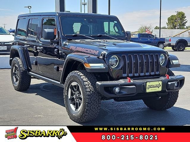 2021 Jeep Wrangler Unlimited Rubicon in Black — front three-quarter view