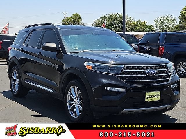 2021 Ford Explorer XLT in Black — front three-quarter view