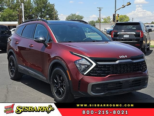2023 Kia Sportage X-Pro in Red — front three-quarter view